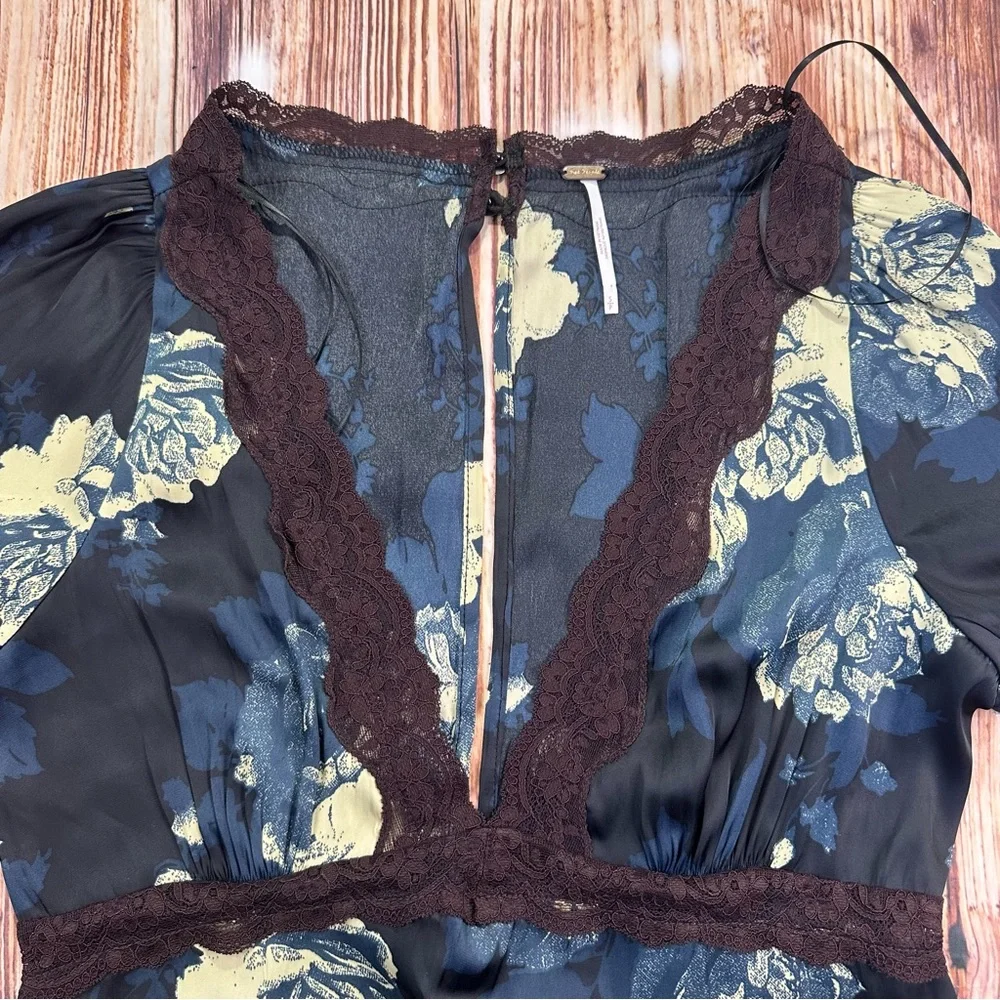 Free People Printed Mini Dress - Black Combo
Size Small - Picture 6 of 15